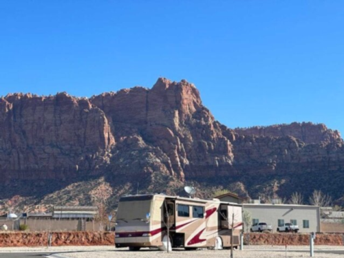 RV parked in front of a mountain at Water Canyon